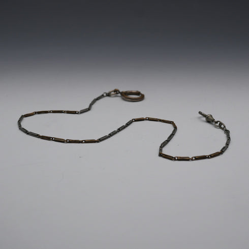 Vintage two-tone alloy Albert chain with a spring ring clasp