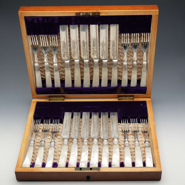 Circa 1900 English Antique Mother-of-Pearl Handle Dessert Cutlery Set (12 Pairs), Sterling Silver Ornamentation, John Round & Son, in Wooden Case