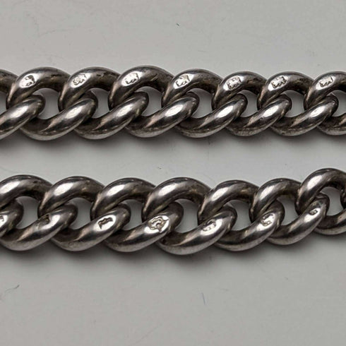 Cadena doble Albert de plata esterlina, antigüedad británica de alrededor de 1900, 34 g, con dije de borla