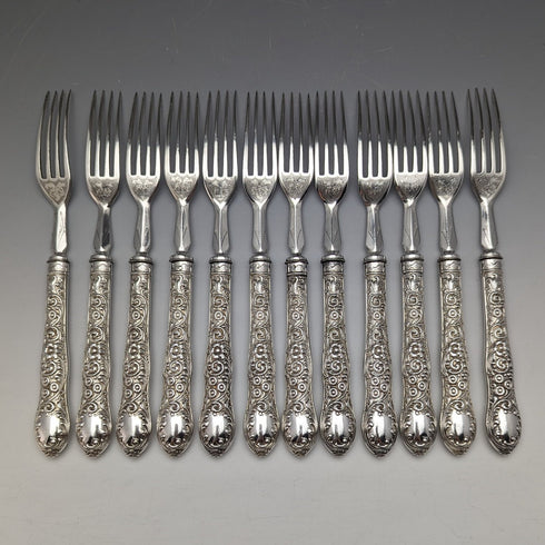 Around 1878 British antique silver plated cutlery set of 11 knives and 12 forks in a wooden box William Gallimore