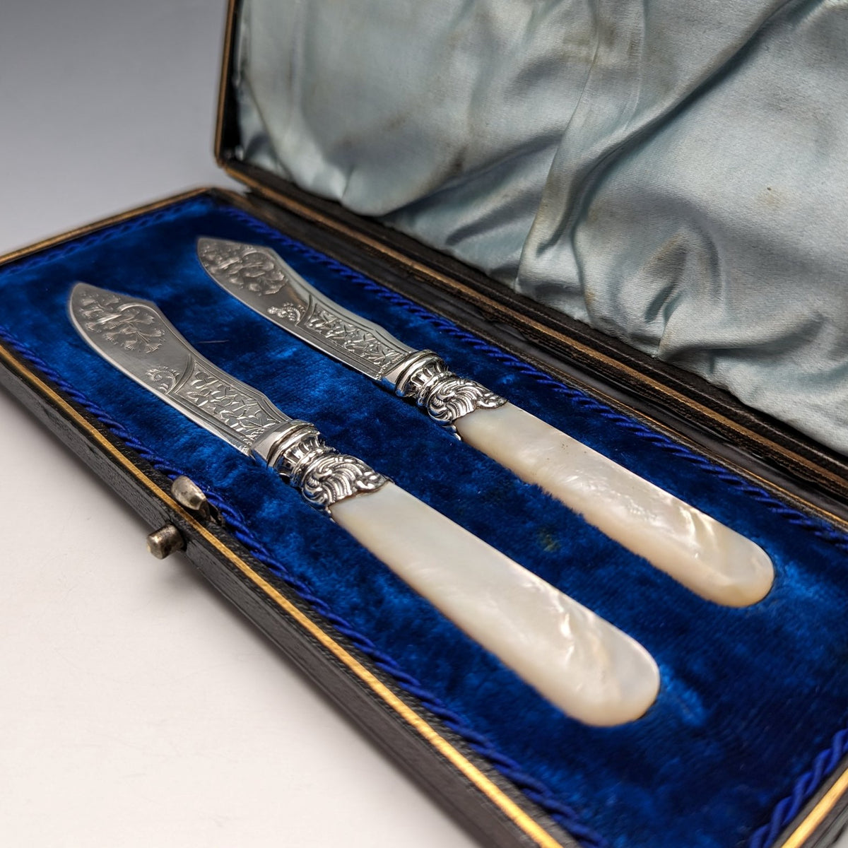 Late 19th Century British Antique White Pearl Handle Butter Knife Pair