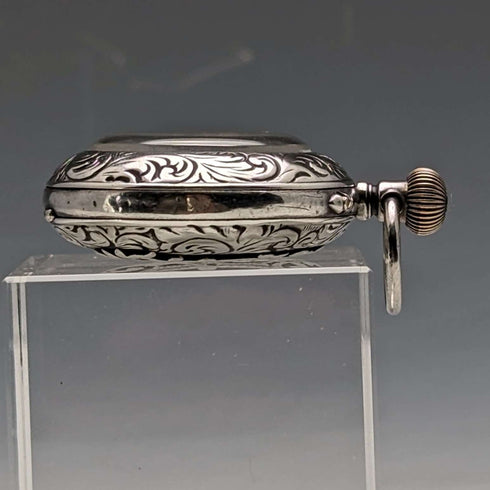 Circa 1900 Antique Swiss made small pocket watch Engraved silver side case Good working condition