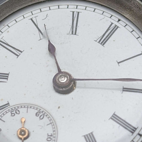 Circa 1900 Antique Swiss made small pocket watch Engraved silver side case Good working condition