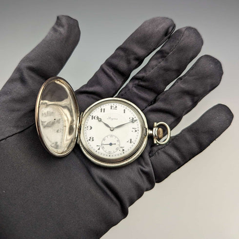 Circa 1923 Antique Longines pocket watch with flower and bird decoration, silver side Niero Hunter case, in good working order