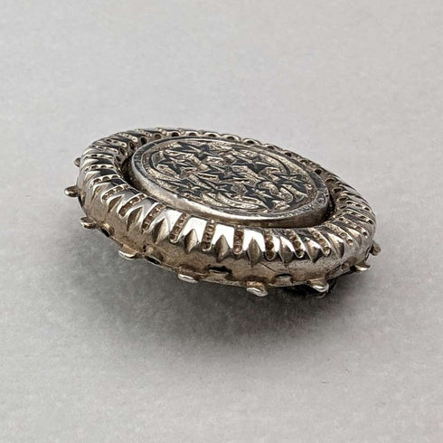 Vintage silver leaf engraved round brooch