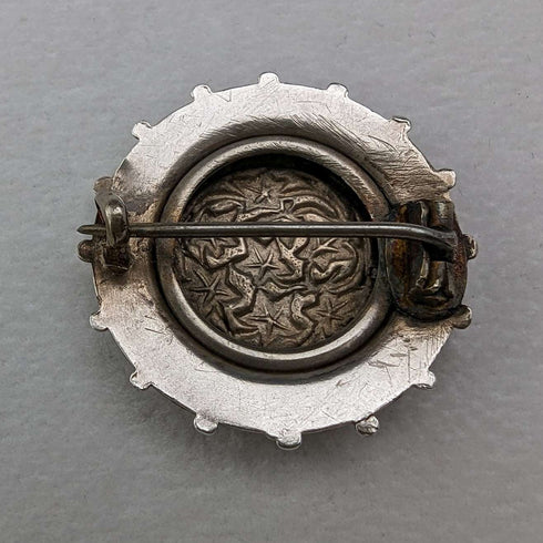 Vintage silver leaf engraved round brooch