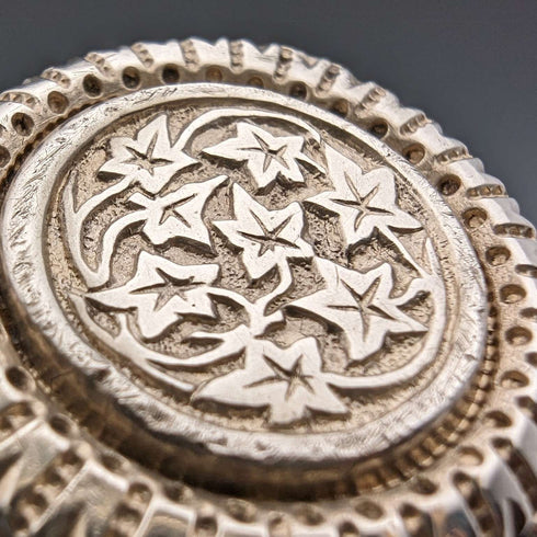 Vintage silver leaf engraved round brooch
