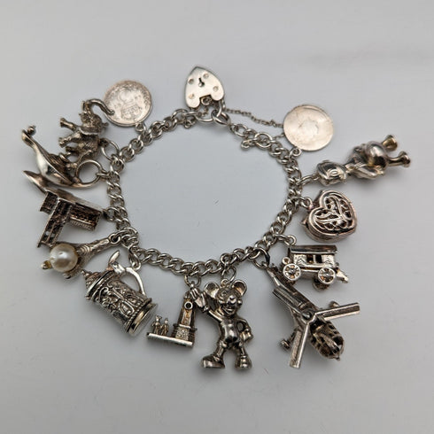 Pulsera de dijes de plata esterlina vintage británica de la década de 1970, 60g