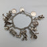 Pulsera de dijes de plata esterlina vintage británica de la década de 1970, 60g