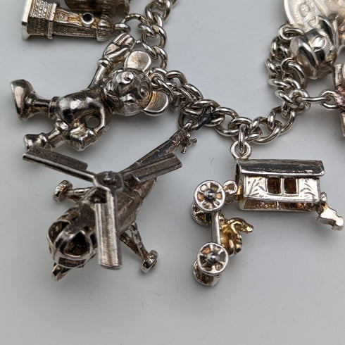 Pulsera de dijes de plata esterlina vintage británica de la década de 1970, 60g