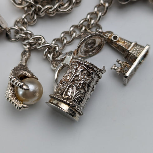 Pulsera de dijes de plata esterlina vintage británica de la década de 1970, 60g