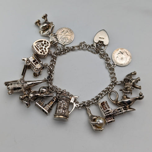 Pulsera de dijes de plata esterlina vintage británica de la década de 1970, 60g