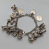 Pulsera de dijes de plata esterlina vintage británica de la década de 1970, 60g