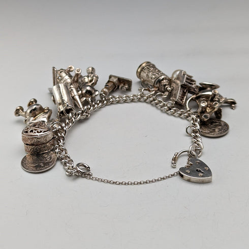 Pulsera de dijes de plata esterlina vintage británica de la década de 1970, 60g
