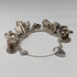Pulsera de dijes de plata esterlina vintage británica de la década de 1970, 60g