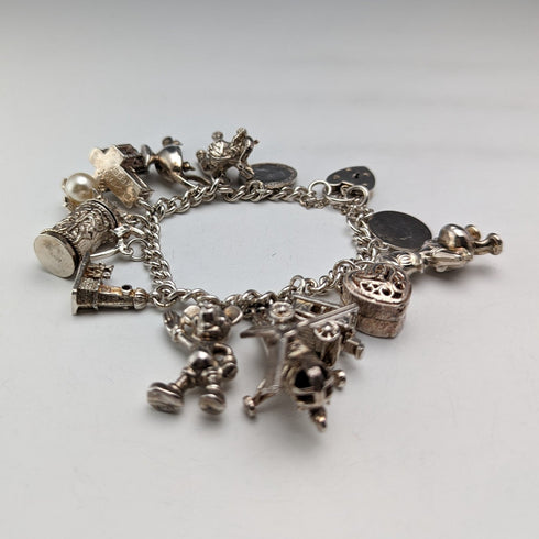 Pulsera de dijes de plata esterlina vintage británica de la década de 1970, 60g