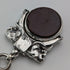 Circa 1900 British antique sterling silver Albert chain, 56g, large two-tone rotating fob
