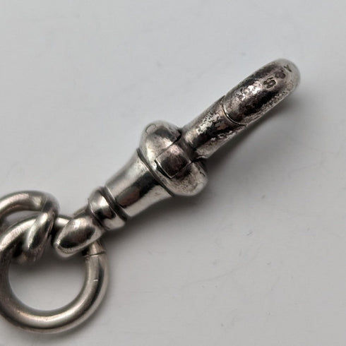 Circa 1900 British antique sterling silver Albert chain, 56g, large two-tone rotating fob