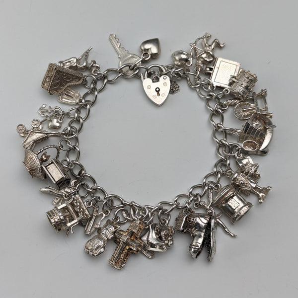 1983 British vintage sterling silver charm bracelet, 53g