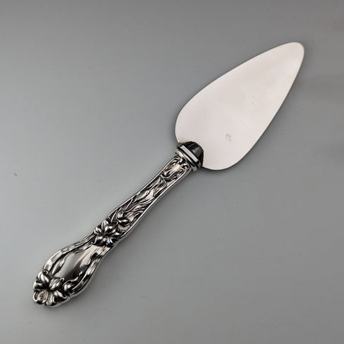 Circa 1910 American antique small cake slicer with sterling silver handle