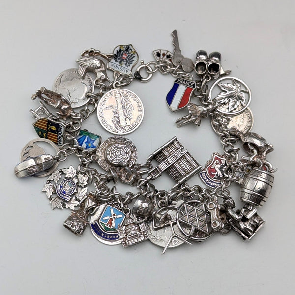 1970s British vintage sterling silver charm bracelet, 68g