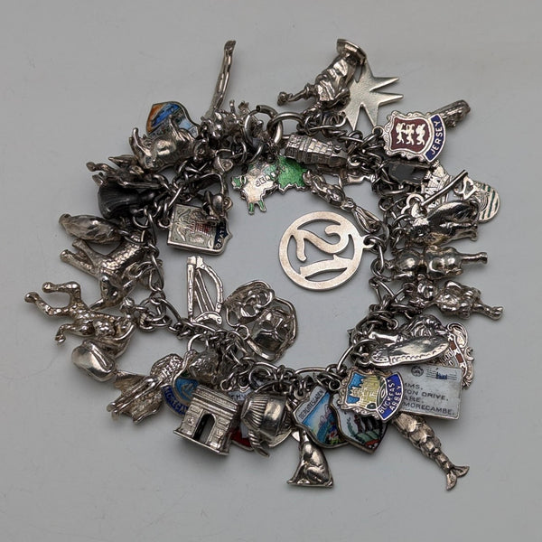 1970s British vintage sterling silver charm bracelet, 95g
