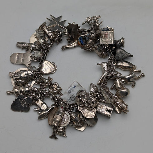 1970s British vintage sterling silver charm bracelet, 95g