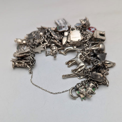 1970s British vintage sterling silver charm bracelet, 95g