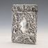 Antique American sterling silver card case with embossed decoration, 75g