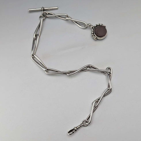 Circa 1900 British antique sterling silver Albert chain, 51g, two-tone natural stone swivel fob