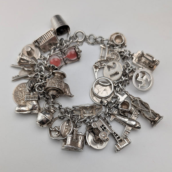 1970's British vintage sterling silver charm bracelet, 78g