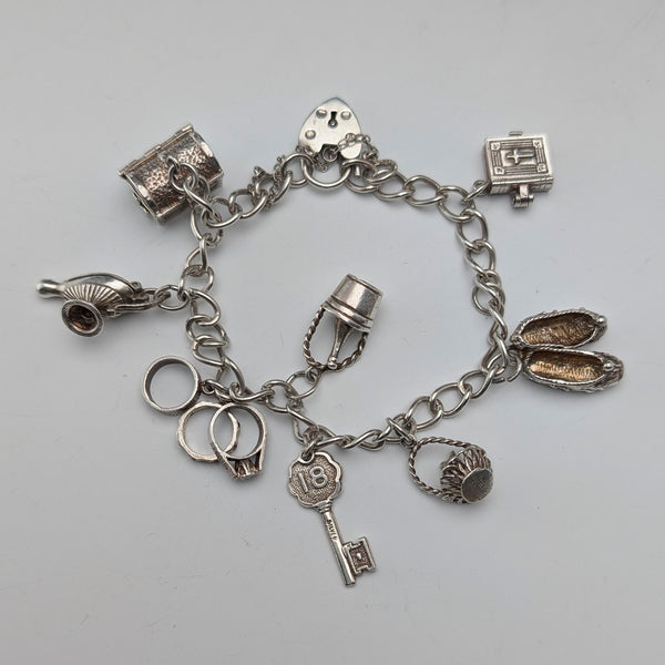 1979 British vintage sterling silver charm bracelet, 33g