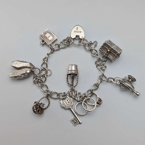 1979 British vintage sterling silver charm bracelet, 33g