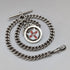 Circa 1900 British antique sterling silver Albert chain, 42g, enamel decoration, sterling silver medal fob