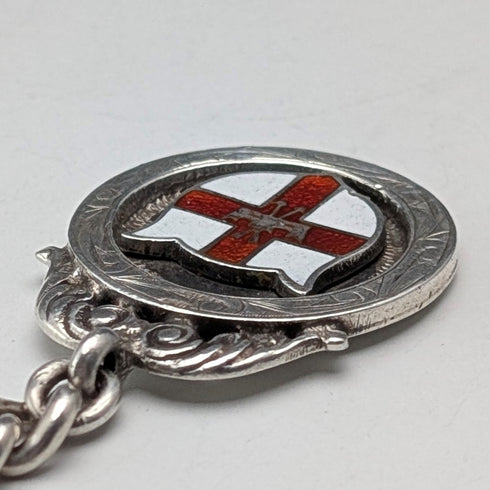 Circa 1900 British antique sterling silver Albert chain, 42g, enamel decoration, sterling silver medal fob