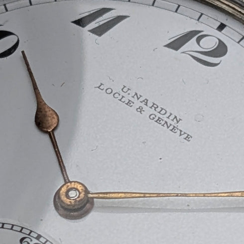 antique Ulysse Nardin pocket watch silver side hunter case works well