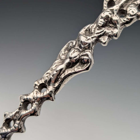 1904 British antique sterling silver large spoon with relief decoration by Samuel Boyce