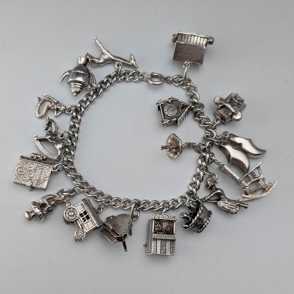 British vintage sterling silver charm bracelet 48g