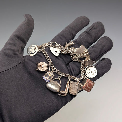 British vintage sterling silver charm bracelet, 48g, padlock clasp