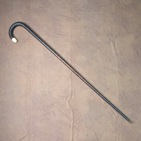 Antique British bone decorated curved handle leather wrapped iron shaft walking stick 89cm