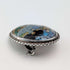 Vintage British sterling silver oval brooch featuring two women with butterfly wings