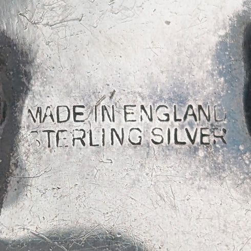 Vintage British sterling silver oval brooch featuring two women with butterfly wings