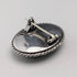 Vintage British sterling silver oval brooch featuring two women with butterfly wings