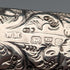 1902 British antique floral decorated sterling silver whistle by William Manton, with chain