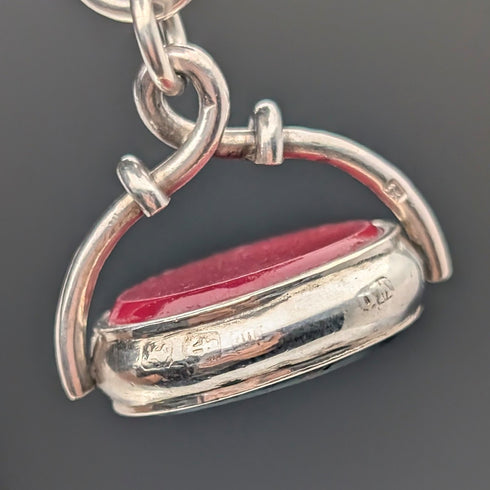 Circa 1919 British antique sterling silver Albert chain, 61g, sterling silver base, two-tone rotating fob