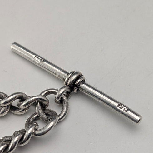 Circa 1919 British antique sterling silver Albert chain, 61g, sterling silver base, two-tone rotating fob