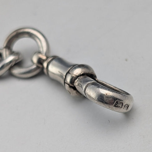 Circa 1919 British antique sterling silver Albert chain, 61g, sterling silver base, two-tone rotating fob