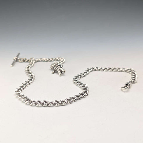 Circa 1900 British antique sterling silver long Albert chain 48g clown charm fob