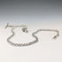 Circa 1900 British antique sterling silver long Albert chain 48g clown charm fob