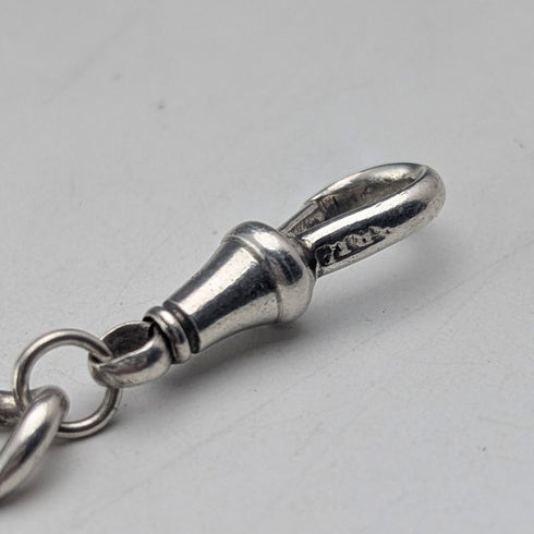 Circa 1900 British antique sterling silver long Albert chain 48g clown charm fob